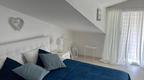 Postel nebo postele na pokoji v ubytování B&B El Dorado