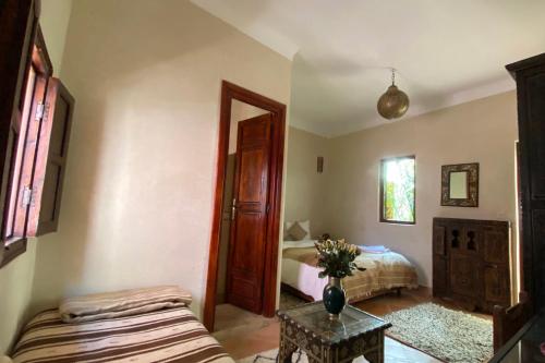 En eller flere senge i et værelse på Riad Of The Storks