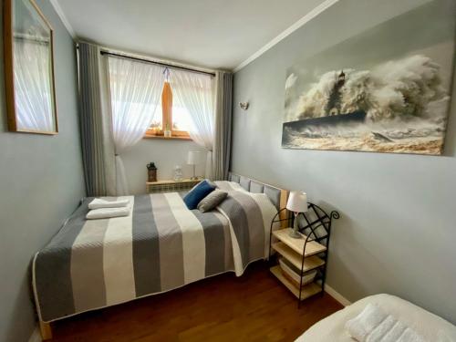 Posteľ alebo postele v izbe v ubytovaní Apartament przy Krupówkach - Laszka