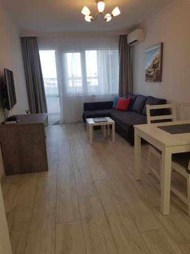 Predel za sedenje v nastanitvi Apartment Neptun