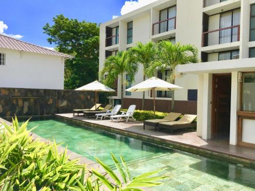 Photo de la galerie de l'établissement Appartement cozy et élégant à 5 minutes des plages, à Mont Choisy