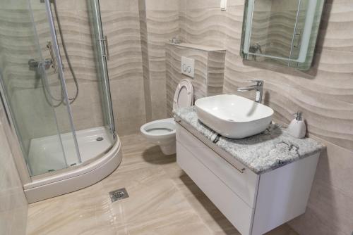Kúpeľňa v ubytovaní Apartmani Dalmacija Drage