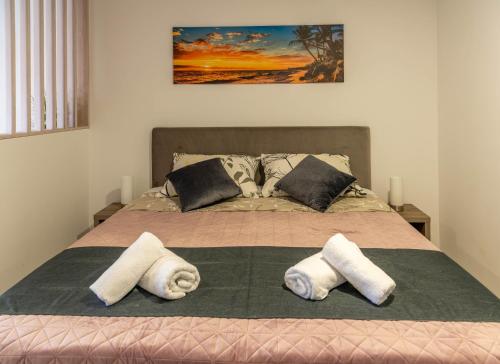 Кровать или кровати в номере Apartmani Dalmacija Drage