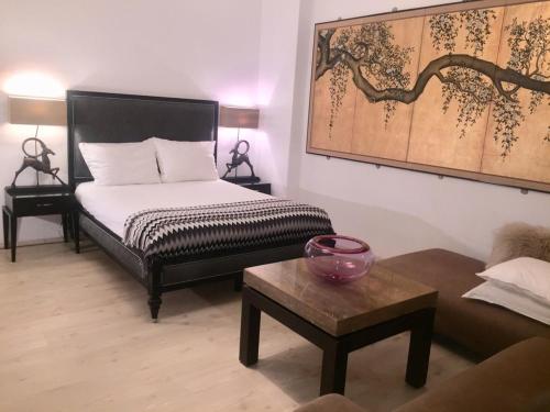 เตียงในห้องที่ Zentrales Apartment -Am Stadtpark-