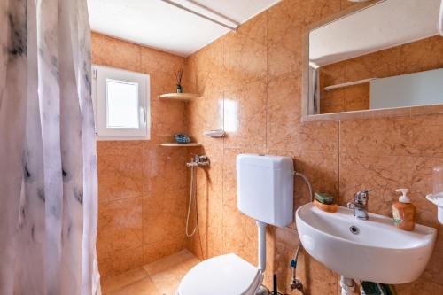 Koupelna v ubytování Pastalia Cottage