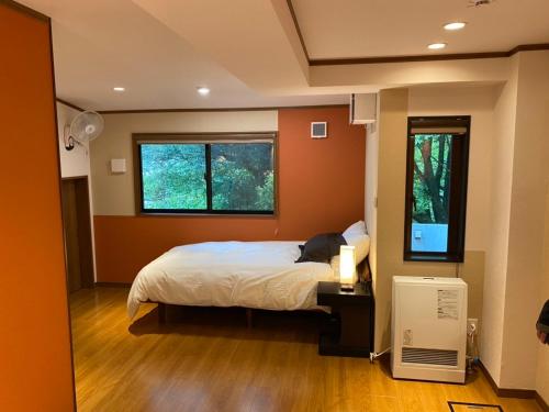 Una cama o camas en una habitación de Chalet Itomic M - Mountain view -