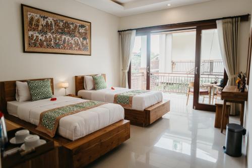 Giường trong phòng chung tại Tu Sandat Homestay