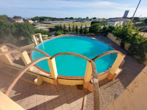 an overhead view of a swimming pool on a balcony at Masia La Bomba in Masnou