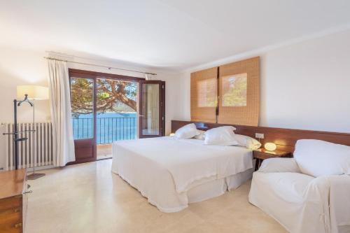 A bed or beds in a room at Villa Lumb