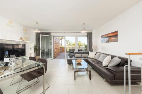 A seating area at MEDANO4YOU Ocean Family Dream Holiday Home