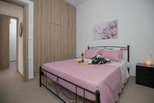 Postel nebo postele na pokoji v ubytování Nicolas Home
