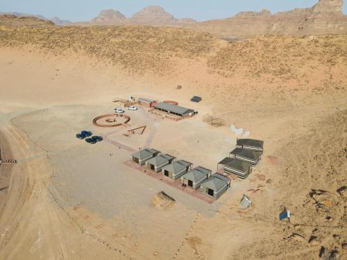 an aerial view of a camping area in the desert at Shakria Bedouin Life Camp in Wadi Rum