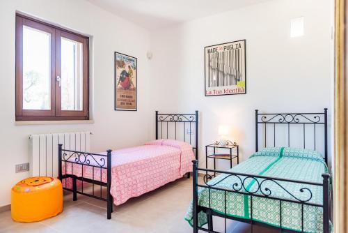 Giường trong phòng chung tại Villa Fiordaliso