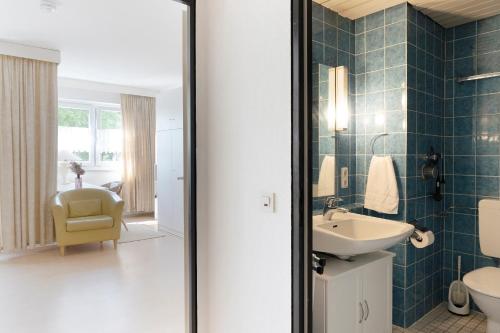 Ett badrum på Berolina Wohnung 103