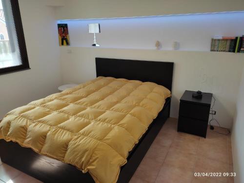 Posteľ alebo postele v izbe v ubytovaní I Colori dell'Etna