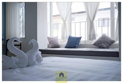 Katil atau katil-katil dalam bilik di Hooman Hostel
