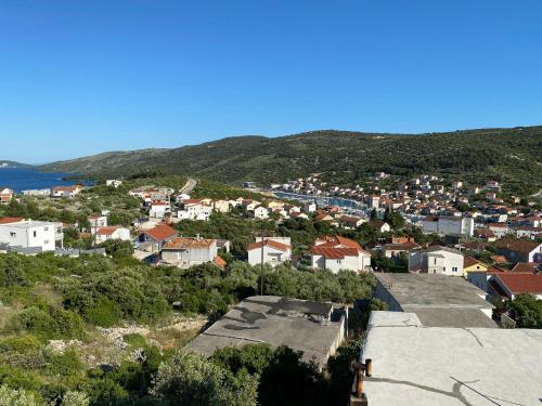 a view of a town from the top of a building at A&M Apartment in Marina