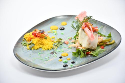 a plate of food on a white table at HB Torrevieja in Torrevieja
