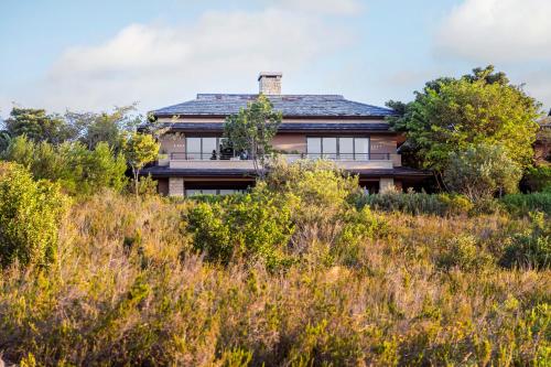 a house on top of a hill at Pezula Nature Retreat in Knysna