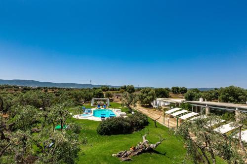 an overhead view of a yard with a swimming pool at Masseria La Cazzigna by Perle di Puglia in Pezze di Greco