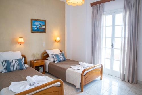 Кровать или кровати в номере Villa Bambas Resort