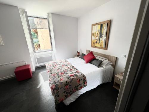 מיטה או מיטות בחדר ב-Les pirondeaux