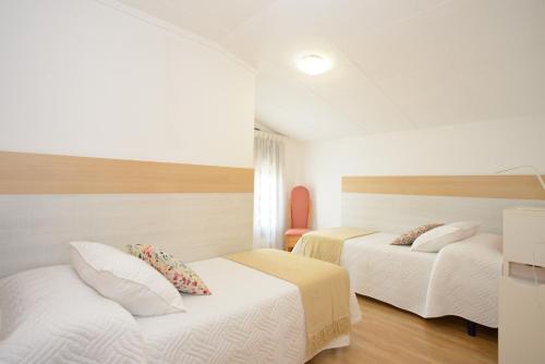 Ένα ή περισσότερα κρεβάτια σε δωμάτιο στο Can Municoy