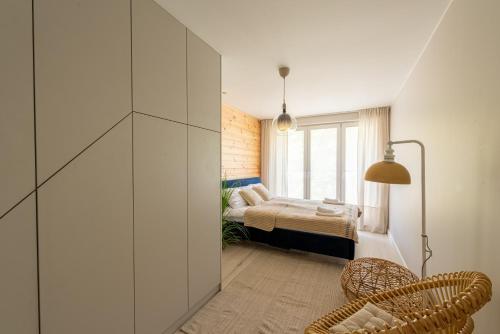 Posteľ alebo postele v izbe v ubytovaní Boho House