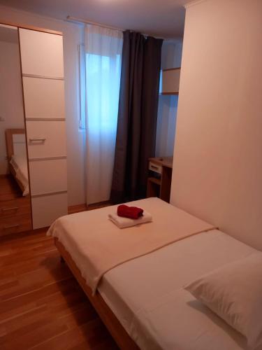 Postel nebo postele na pokoji v ubytování Apartman Gizdavac