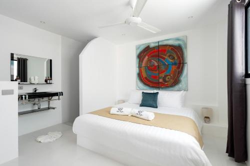 Giường trong phòng chung tại Leelawadee Apartment