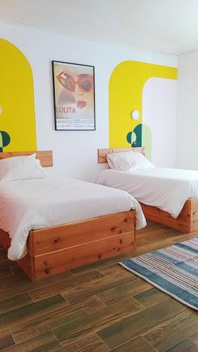 Katil atau katil-katil dalam bilik di Solo Azores Guesthouse