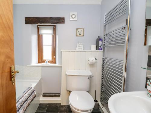 Et badeværelse på Lavender Cottage