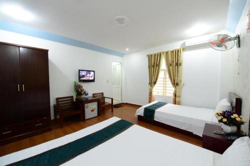 Una cama o camas en una habitación de catba island hotel