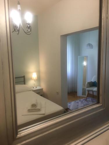 Postel nebo postele na pokoji v ubytování Apartments Leut