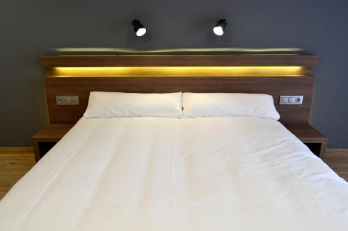 Postel nebo postele na pokoji v ubytování Hotel Alda Sada Marina