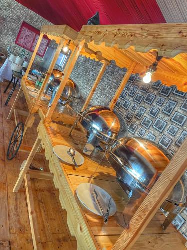a bunch of pots and pans on a table at Rum Oasis Luxury Camp in Wadi Rum