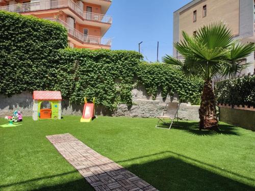 Zahrada ubytování Appartamento incantevole con parcheggio e giardino