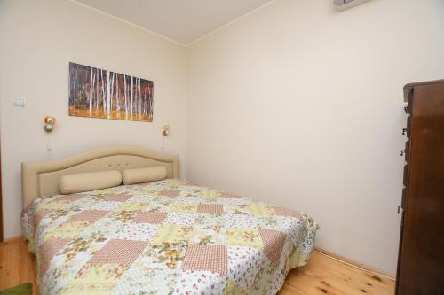 Postel nebo postele na pokoji v ubytování Weekendaya