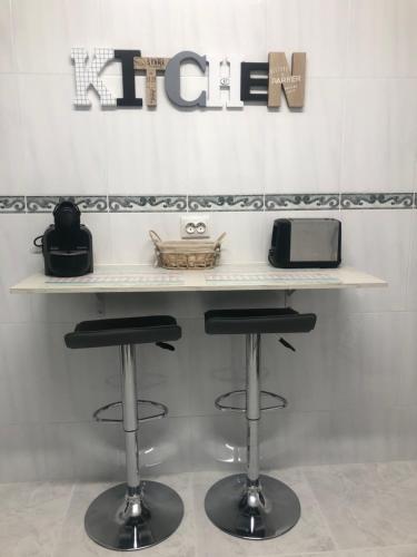 Küche/Küchenzeile in der Unterkunft SANJUANPORTALE apartamento parking gratuito cercano