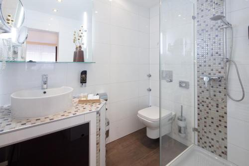 Ванная комната в Hotel Mondial