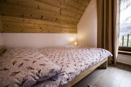 Cama ou camas em um quarto em Apartamenty na Wierchu