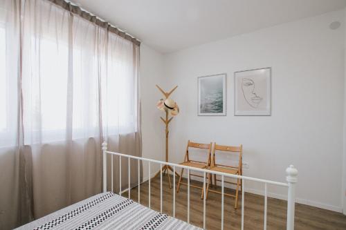 Postel nebo postele na pokoji v ubytování EVA's Apartment