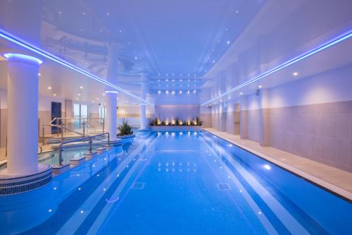 a large swimming pool in a large building at St Michaels The Liner in Falmouth