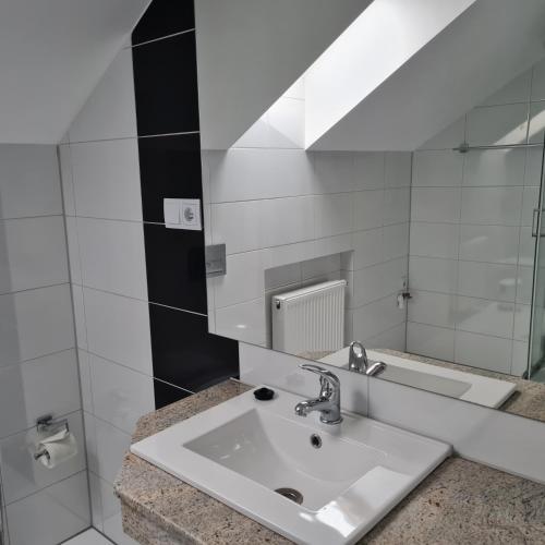 Kúpeľňa v ubytovaní Apartament Wileńska