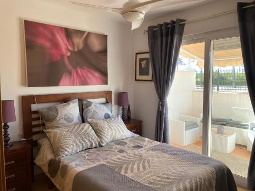 Katil atau katil-katil dalam bilik di Condado de Alhama JARDIN 11 SV17