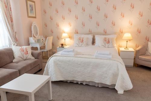 Postel nebo postele na pokoji v ubytování Rosita Guest House