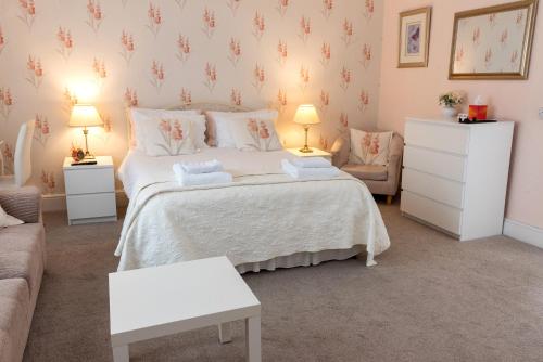 Postel nebo postele na pokoji v ubytování Rosita Guest House