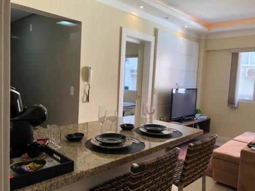 Dapur atau dapur kecil di PÉ NA AREIA - Suíte à beira-mar com garagem