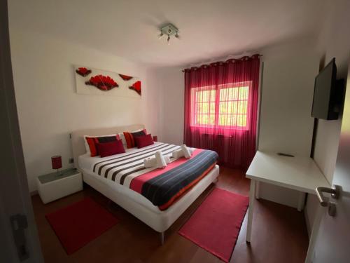 Katil atau katil-katil dalam bilik di Cantinho Verde T3