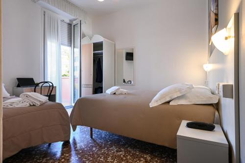 Postel nebo postele na pokoji v ubytování Amadei Hotel Blumen